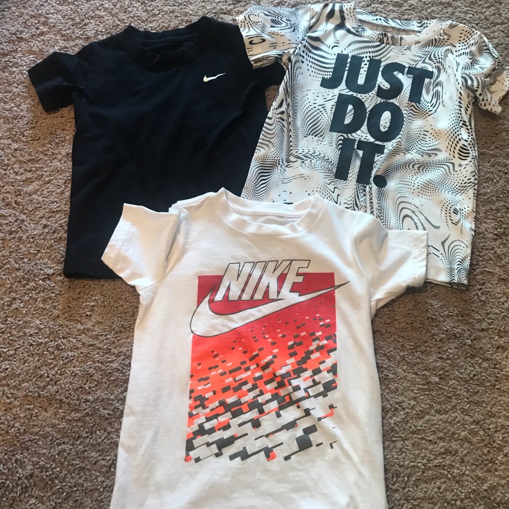 Three Nike t-shirts